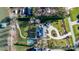 An aerial view of a beautiful property with manicured landscaping, a pool, and lake access at 4165 54Th Ne Ave, Hickory, NC 28601