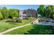 Expansive backyard featuring a patio, landscaped garden beds, and a walkway leading to the pool at 4165 54Th Ne Ave, Hickory, NC 28601