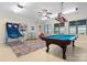 Fun game room in the basement with a pool table and basketball game at 4165 54Th Ne Ave, Hickory, NC 28601