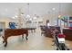 Large finished basement with foosball table, pool table, bar, and motorcycle at 4165 54Th Ne Ave, Hickory, NC 28601
