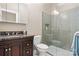 Stylish bathroom features granite countertop, tile flooring, and a modern glass shower at 4165 54Th Ne Ave, Hickory, NC 28601