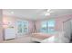 Charming bedroom with pastel colors, light carpet, and views of the lake at 4165 54Th Ne Ave, Hickory, NC 28601