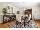 Elegant dining room with hardwood floors and a beautiful chandelier at 4165 54Th Ne Ave, Hickory, NC 28601