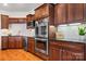 Gourmet kitchen featuring stainless steel appliances and rich wood cabinetry at 4165 54Th Ne Ave, Hickory, NC 28601