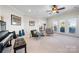 Living room with a ceiling fan, natural light, and french doors at 4165 54Th Ne Ave, Hickory, NC 28601