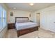 Main bedroom with king-size bed and window at 4418 Huntley Glen Dr, Pineville, NC 28134