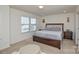 Main bedroom with king bed and large window at 4418 Huntley Glen Dr, Pineville, NC 28134