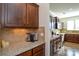 Kitchen features granite counters and custom cabinetry at 4418 Huntley Glen Dr, Pineville, NC 28134