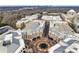 Aerial view of a community with shops and residential buildings at 4620 Piedmont Row Dr # 509, Charlotte, NC 28210