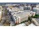 Property features building with parking and rooftop pool at 4620 Piedmont Row Dr # 509, Charlotte, NC 28210