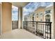 Private balcony overlooks the city and streets below at 4620 Piedmont Row Dr # 509, Charlotte, NC 28210