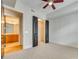 Bedroom with ceiling fan and access to bathroom and closet at 4620 Piedmont Row Dr # 509, Charlotte, NC 28210