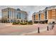 Luxury condo building with shops and fountain at 4620 Piedmont Row Dr # 509, Charlotte, NC 28210