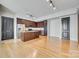 Modern kitchen with island and stainless steel appliances at 4620 Piedmont Row Dr # 509, Charlotte, NC 28210