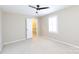 Well-lit bedroom with carpet and a walk-in closet at 4750 Pennington Meadows Cir, Rock Hill, SC 29732