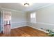 Dining room with hardwood floors, plantation shutters, kitchen view at 4750 Pennington Meadows Cir, Rock Hill, SC 29732