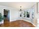 Sunlit dining area with hardwood floors and bay window at 4750 Pennington Meadows Cir, Rock Hill, SC 29732