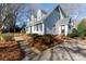 A charming one-story house with a blue door and well-maintained landscaping at 4750 Pennington Meadows Cir, Rock Hill, SC 29732