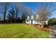 White house with a blue door, shutters, and landscaping at 4750 Pennington Meadows Cir, Rock Hill, SC 29732