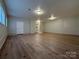 Large finished basement with an open layout and plenty of natural light at 648 Scotts Creek Rd, Statesville, NC 28625