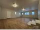 Spacious finished basement offering versatility as a recreation room or extra living space at 648 Scotts Creek Rd, Statesville, NC 28625