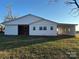 White vinyl siding addition with covered patio at 648 Scotts Creek Rd, Statesville, NC 28625