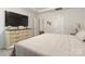 Spacious bedroom with large dresser and comfortable bed at 8715 Pennegrove Cir, Charlotte, NC 28214