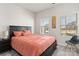 Cozy bedroom with a double bed and neutral tones at 8715 Pennegrove Cir, Charlotte, NC 28214