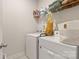 Laundry room with washer, dryer, and shelving at 8715 Pennegrove Cir, Charlotte, NC 28214