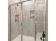 Clean and modern shower with built-in shelving at 8715 Pennegrove Cir, Charlotte, NC 28214