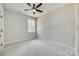 Well-lit bedroom with ceiling fan and window at 936 Jackson Rd, Fort Lawn, SC 29714