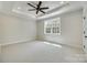 Spacious bedroom with carpeted floors and large window at 936 Jackson Rd, Fort Lawn, SC 29714