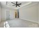 Bright bedroom featuring a ceiling fan and ensuite bathroom access at 936 Jackson Rd, Fort Lawn, SC 29714