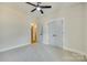 Bedroom with ceiling fan and double doors at 936 Jackson Rd, Fort Lawn, SC 29714