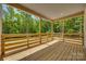 Spacious wooden deck with wooded views at 936 Jackson Rd, Fort Lawn, SC 29714