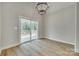 Dining area with hardwood floors and access to backyard deck at 936 Jackson Rd, Fort Lawn, SC 29714