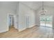 Dining area with hardwood floors and sliding glass door to deck at 936 Jackson Rd, Fort Lawn, SC 29714