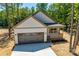 Exterior of new house with gray garage door at 936 Jackson Rd, Fort Lawn, SC 29714