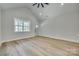 Light and bright living room with hardwood floors and gray door at 936 Jackson Rd, Fort Lawn, SC 29714