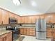 Modern kitchen featuring stainless steel appliances and ample cabinetry at 5559 Prosperity View Dr, Charlotte, NC 28269