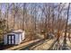 View of backyard with shed and trees at 1013 Ashwood Pl, Salisbury, NC 28146