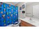 Bathroom with Minecraft-themed shower curtain and neutral vanity at 1013 Ashwood Pl, Salisbury, NC 28146