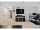 Living room with TV, desk, and access to other rooms at 1013 Ashwood Pl, Salisbury, NC 28146