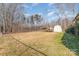 Large backyard with shed and open space at 102 Hickory St, Locust, NC 28097