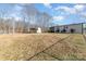 Large backyard with shed and open space at 102 Hickory St, Locust, NC 28097