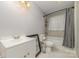 Clean bathroom with a bathtub, toilet and vanity at 102 Hickory St, Locust, NC 28097