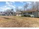 House with RV parking and spacious yard at 102 Hickory St, Locust, NC 28097