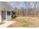 Front porch and side yard of a house at 102 Hickory St, Locust, NC 28097