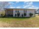 Exterior view of a single story home at 102 Hickory St, Locust, NC 28097