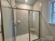 Shower with tile surround and glass door at 104 Kerr Walk Dr # 14, Statesville, NC 28677